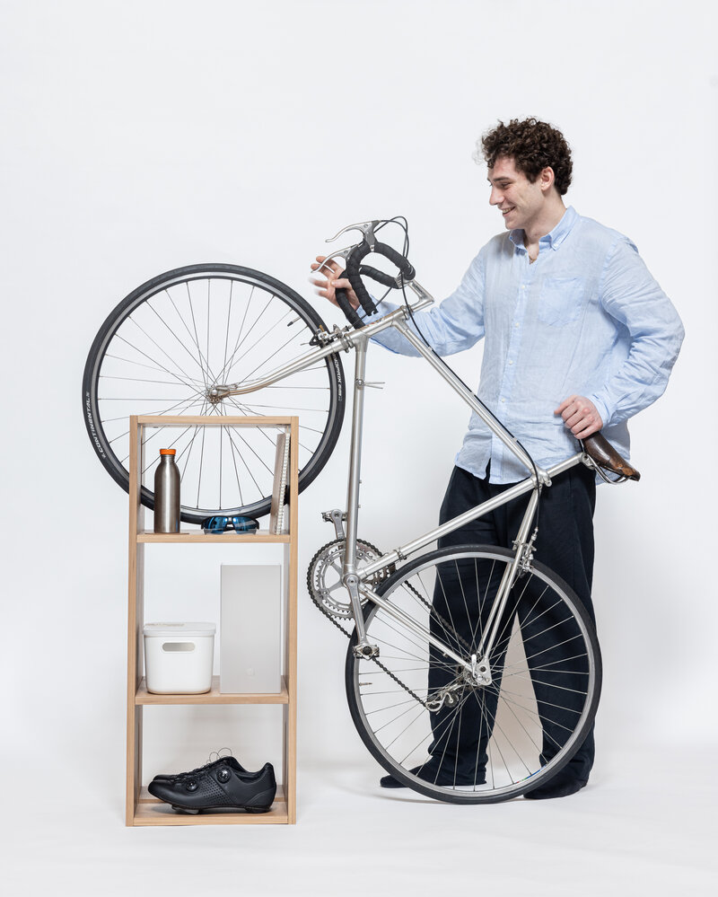 Upright bicycle storage shown with designer