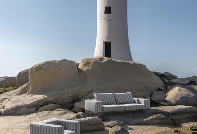 Costiera sofa and lounge on sandy outcropping with lighthouse