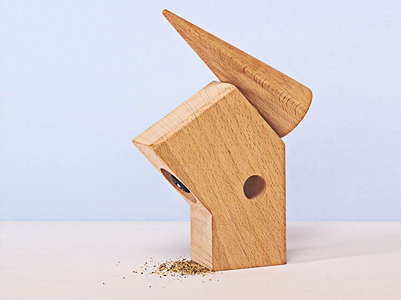 Pepper mill with wood block shape and pyramidal shape