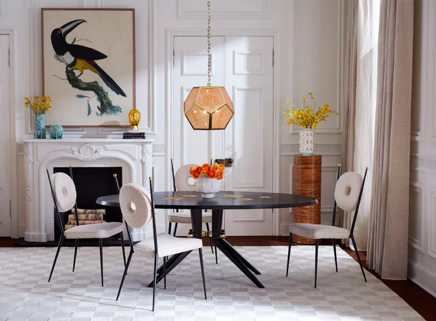 Three Rondo chairs around dining table in posh living room