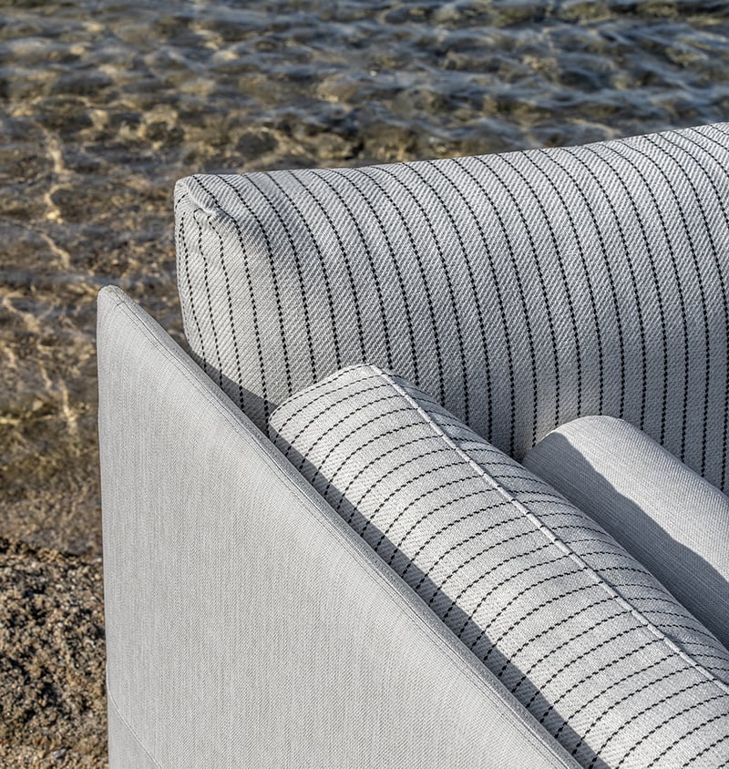 Baia sofa detail gray upholstery with thin black lines detail