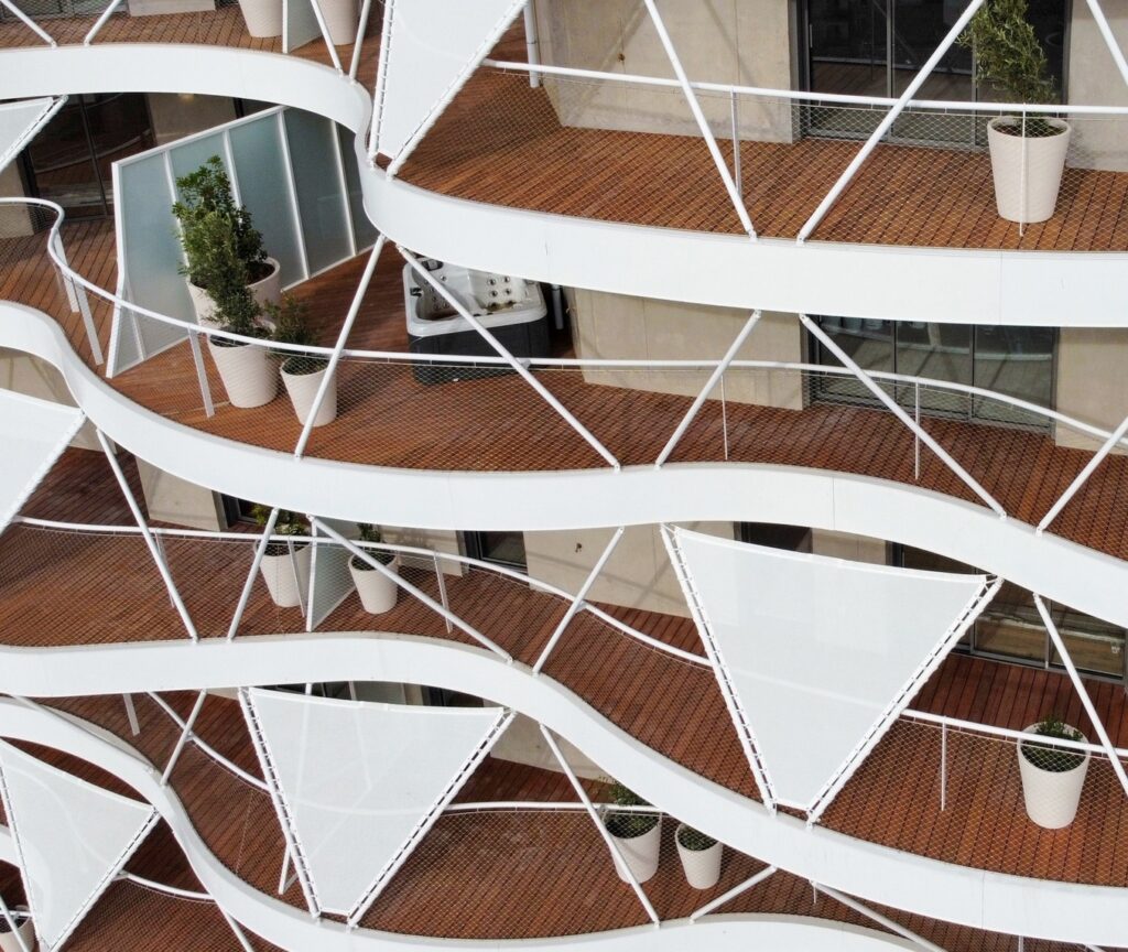 View from outside of multiple floor of Higher Roch Tower with bamboo decking