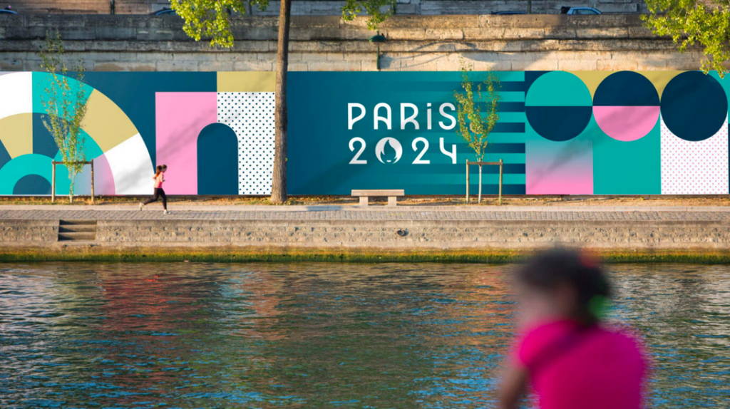 Paris 2024 signage and branding along the river