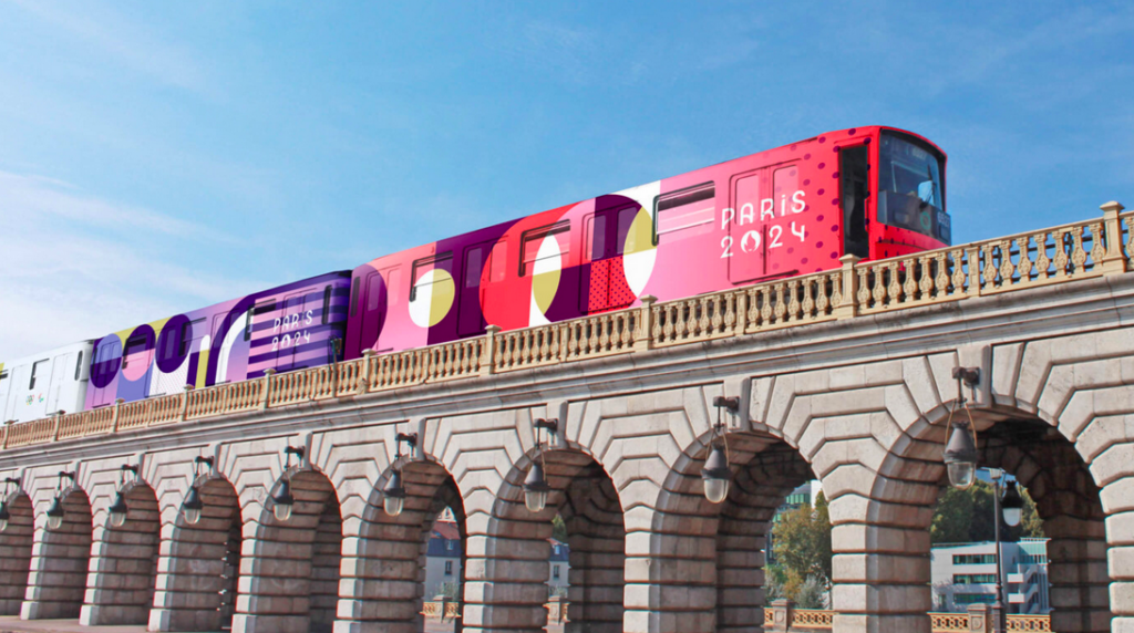 A Metro wrapped in Paris 2024 branding