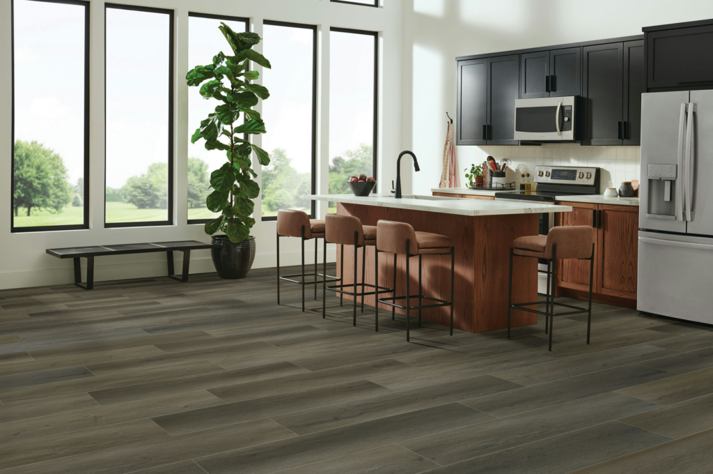 Ingenious Plank resilient flooring in gray  in kitchen