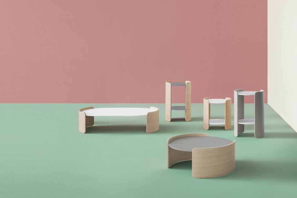 Parenthesis family: round small, round large, and oval coffee table