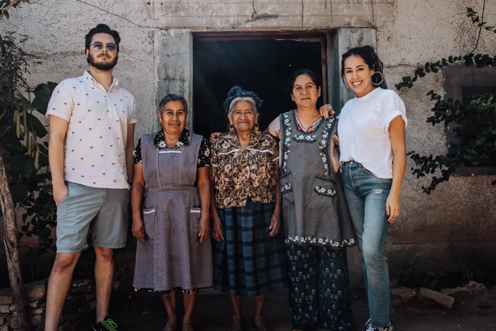 Francesca and John of Casa Brixe with artisans from the Vida Nueva Cooperative in Mexico