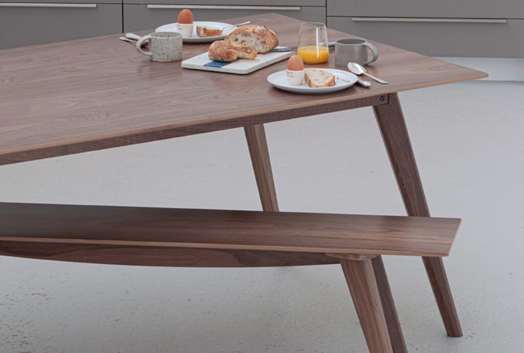 Kielder in Walnut with dishes on tabletop