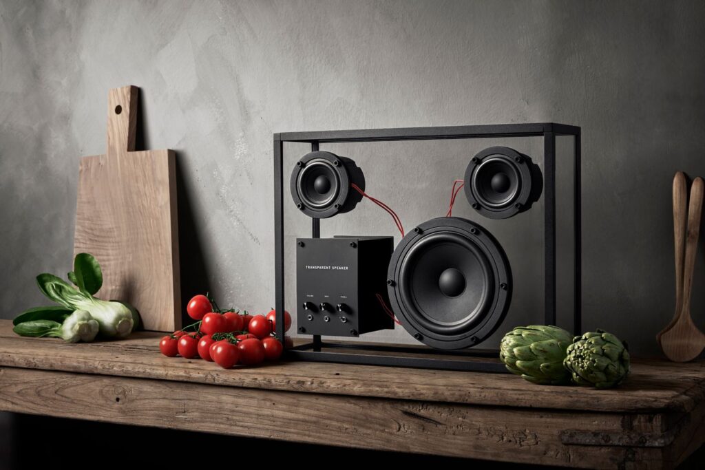 See-through speaker on shelf with vegetables