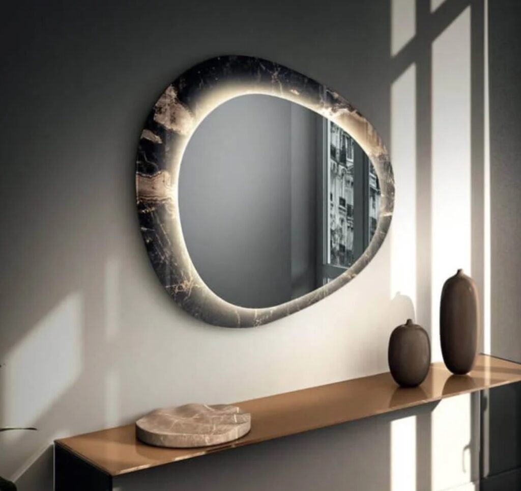 Mirror with asynchronous oval shape and dark marble frame