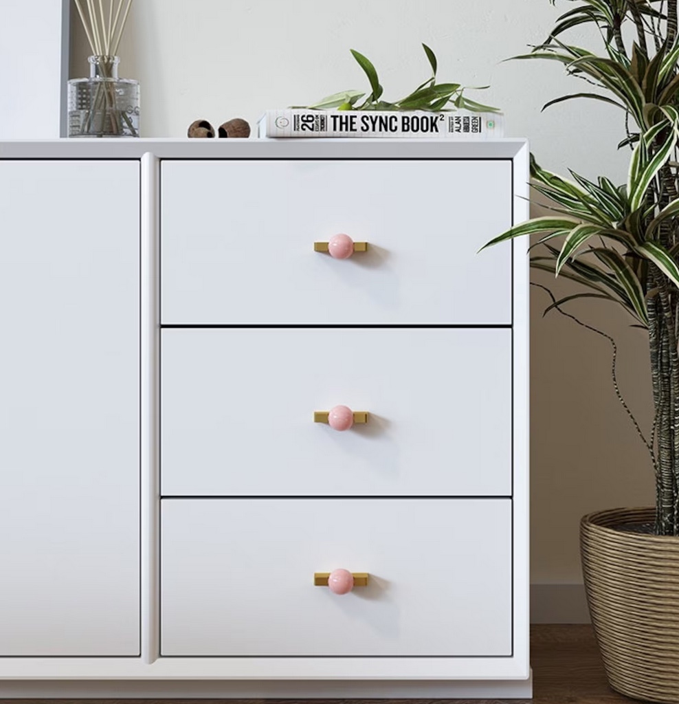 Rose Quartz pull on white cabinet