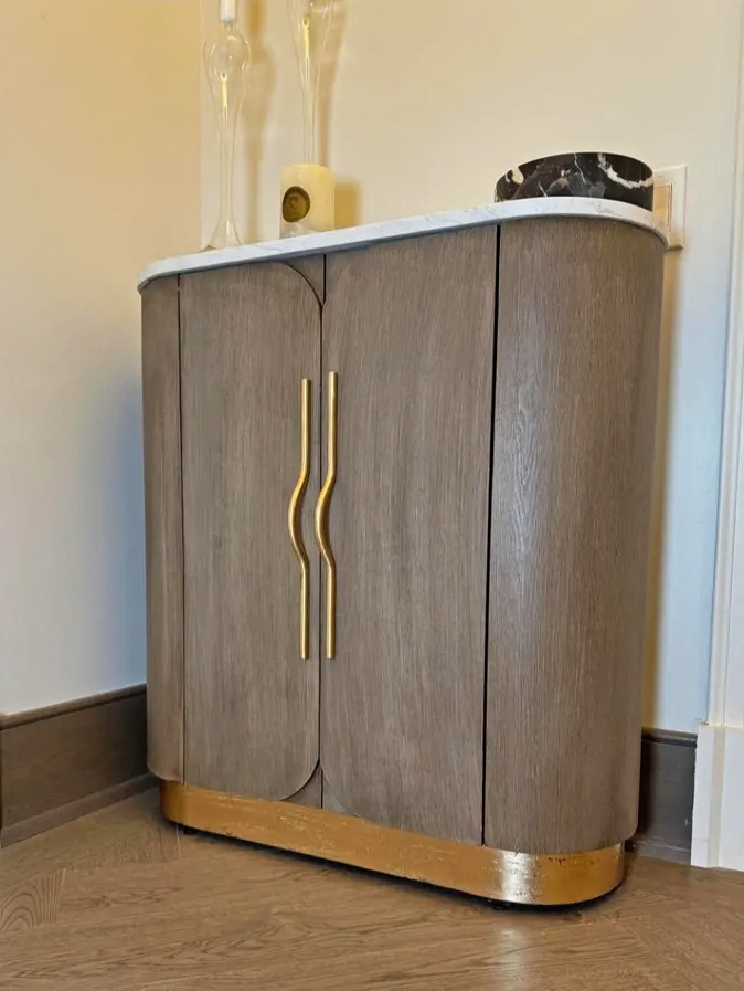 armoire with brass handles