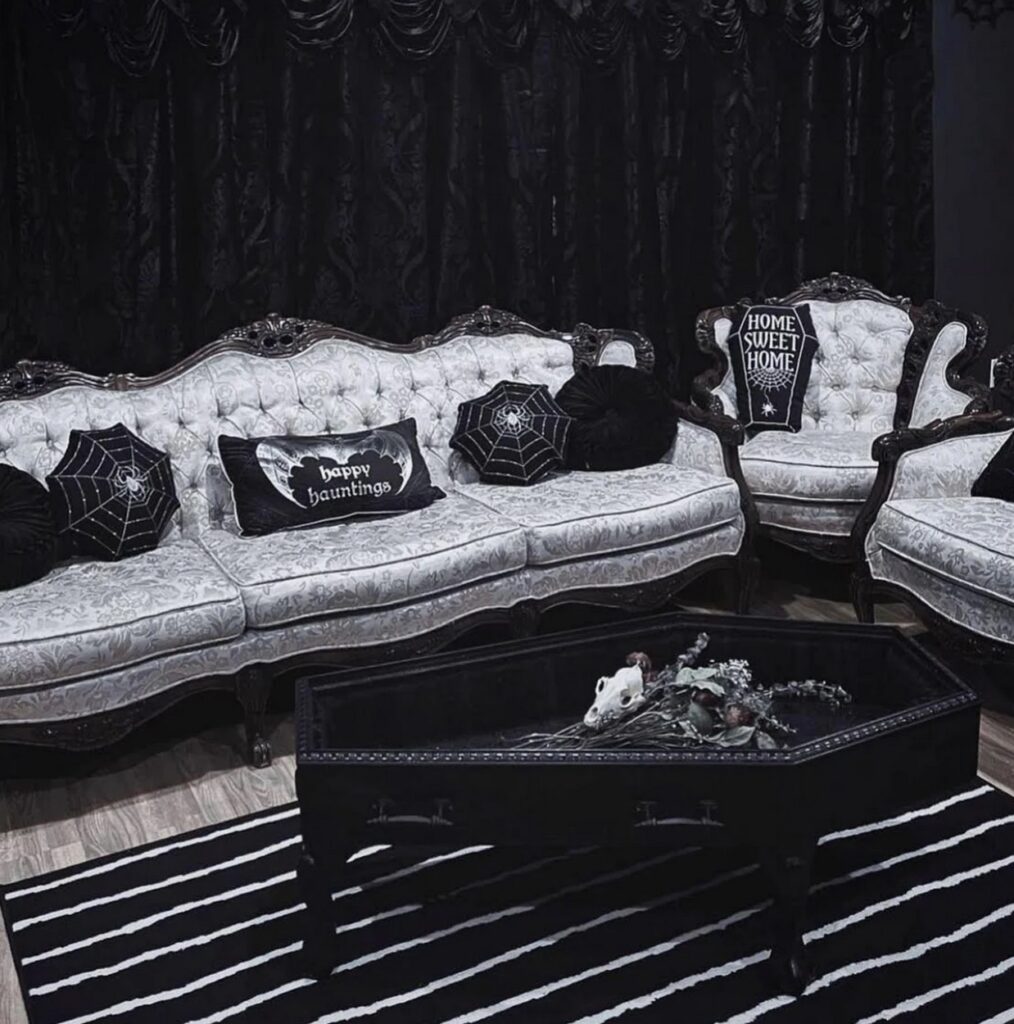 Table shaped like a coffin with gothic style couch