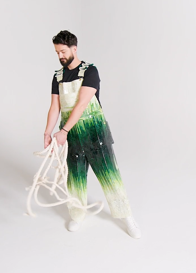 William Storms wearing tile overalls